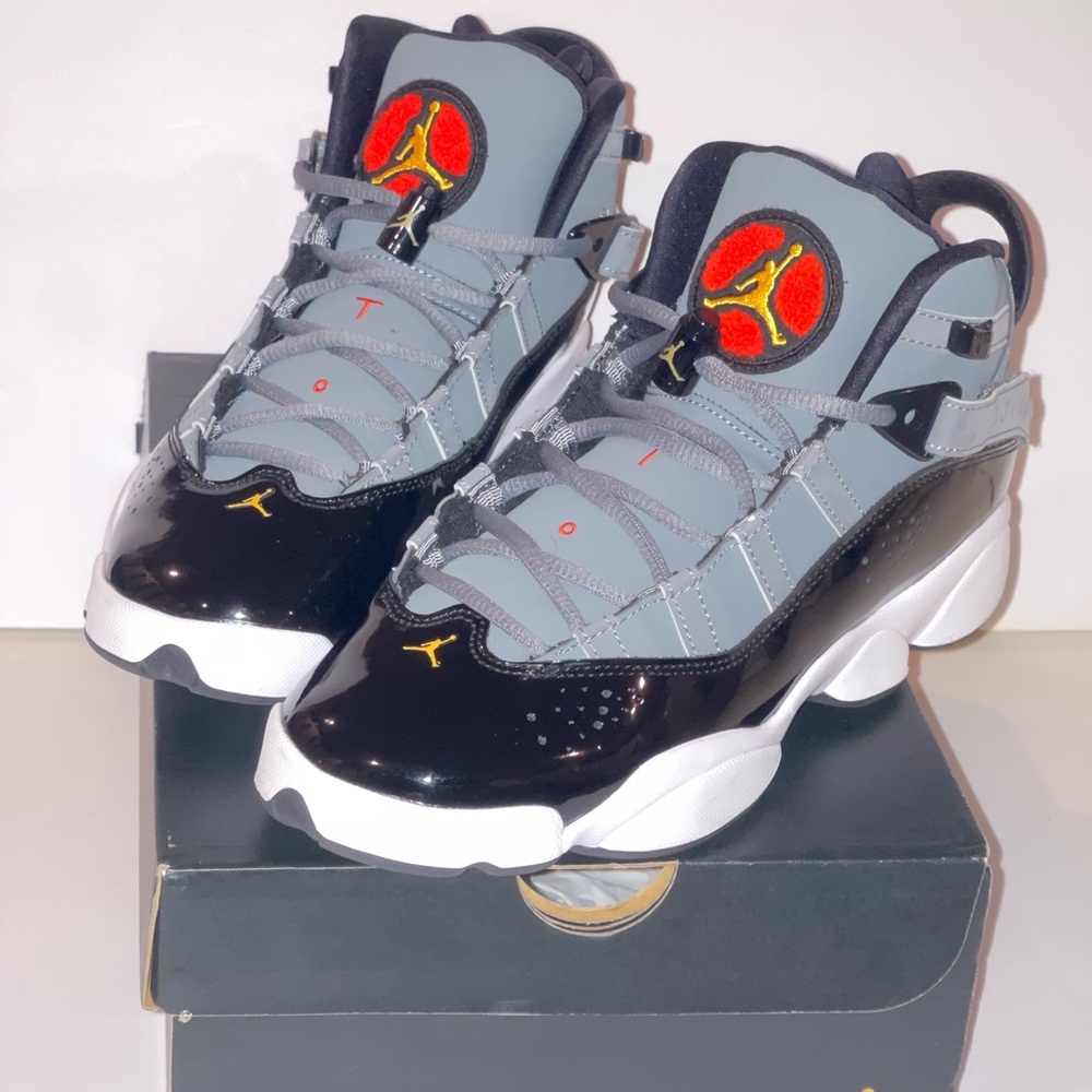 Jordan Kids Black and Gray Sneakers with Red Accents